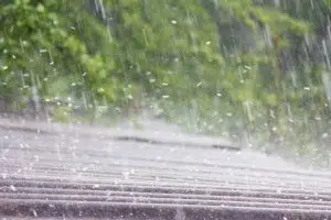hail falls on the roof of slate