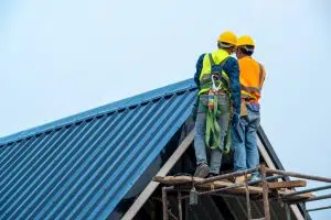 Big Easy Roofing's experts inspecting roof