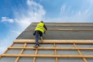 Man Working on a Commercial Roof