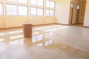 bucket and water on the flooring