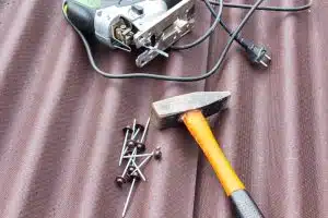 hammer, power tool, nails, roof background