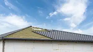 rooftop with metal tile on blue sky background