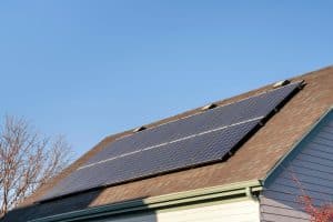 asphalt shingle with solar panel installed