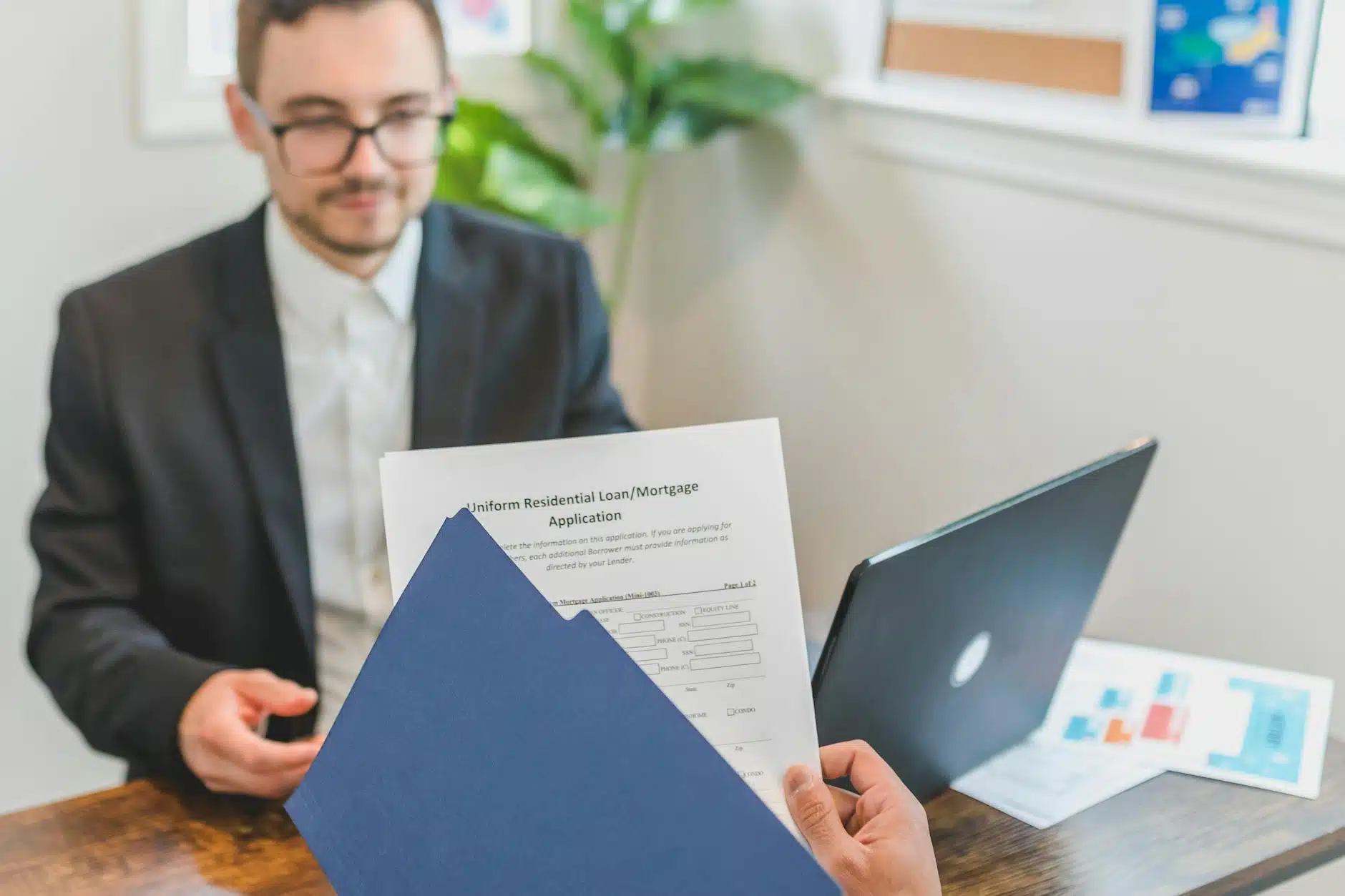 homeowner reviewing roofing financing paperwork