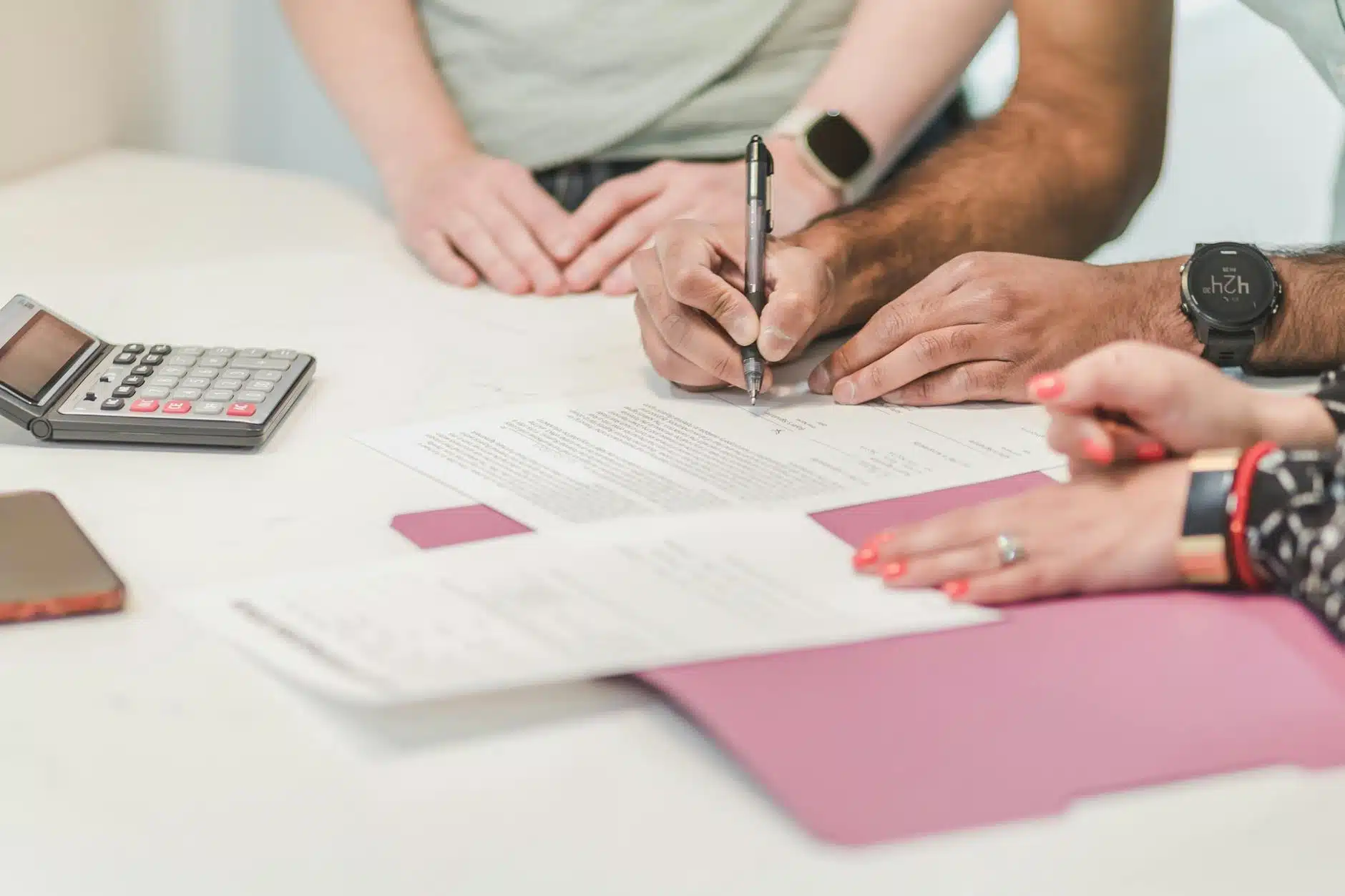 couple signing home improvement financing agreement
